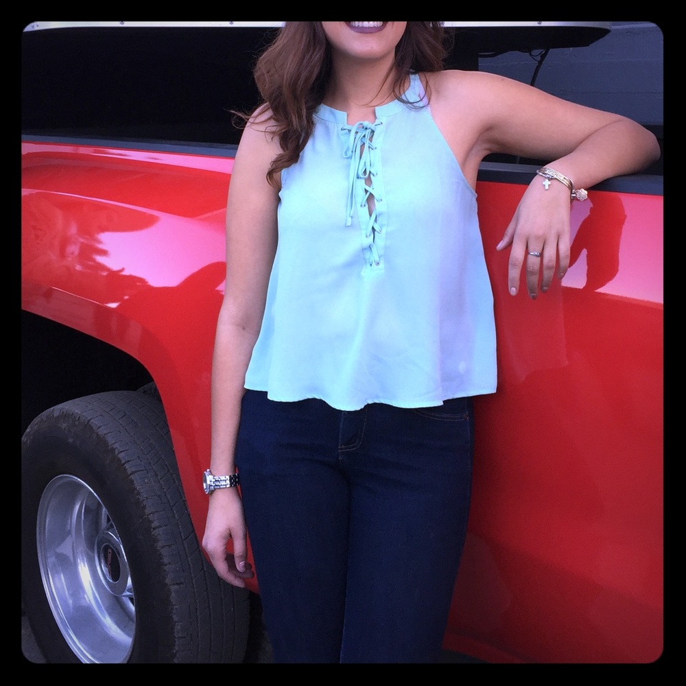 Lace up front sleeveless blouse